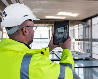 architect using construction technology discovered by a SWOT analysis