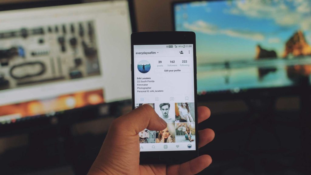 man viewing responsive web design iphone instagram 1