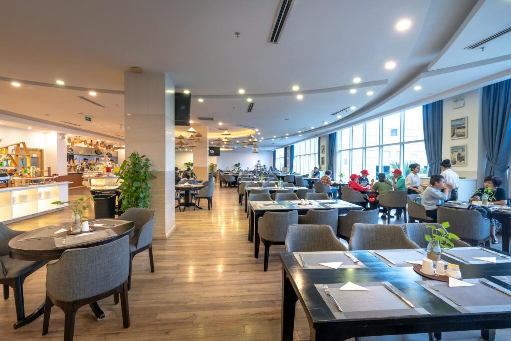 Spacious modern restaurant interior with guests dining